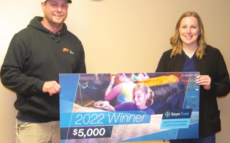 A $5,000 donation was given to Crain Farms