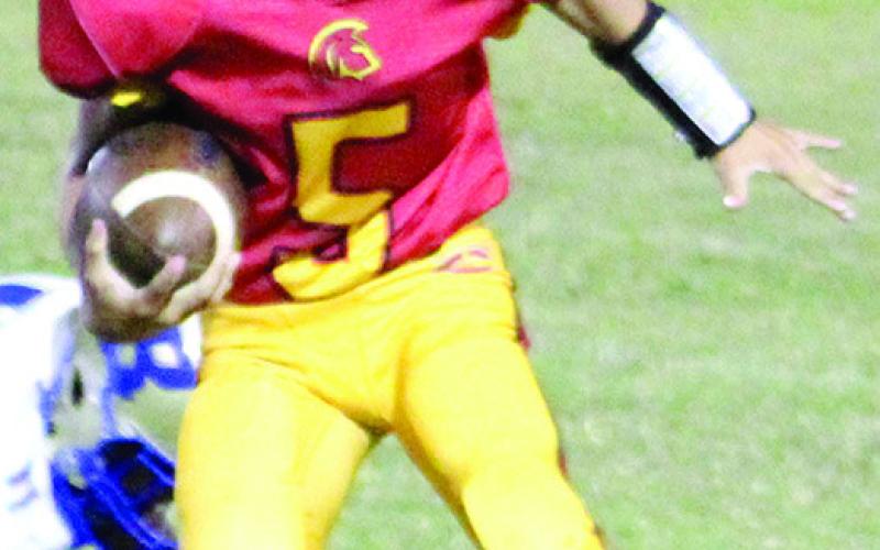 Blaze Bowman rushed for two touchdowns and passed for one in the Junior High Titans Seventh Grade shutout over Riverton, 22-0, Thursday at Titan Stadium.