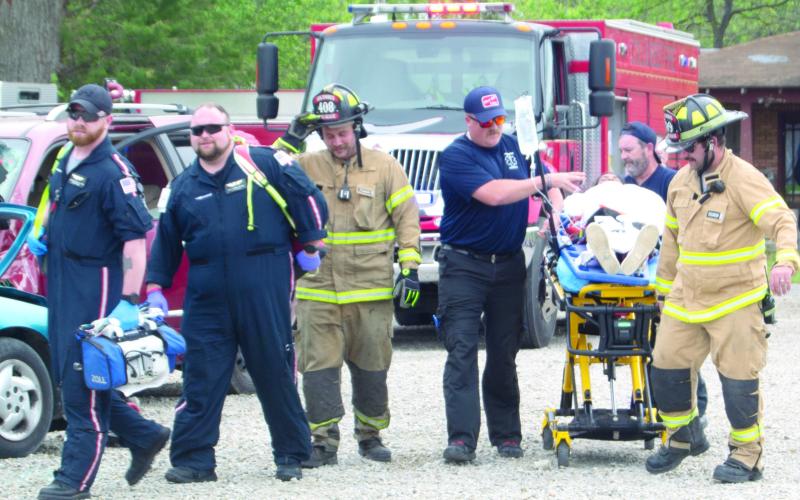 The Medflight personnel assisted in loading the victims for the flight as the EMS and fire fighters finished up the work at the wreck.
