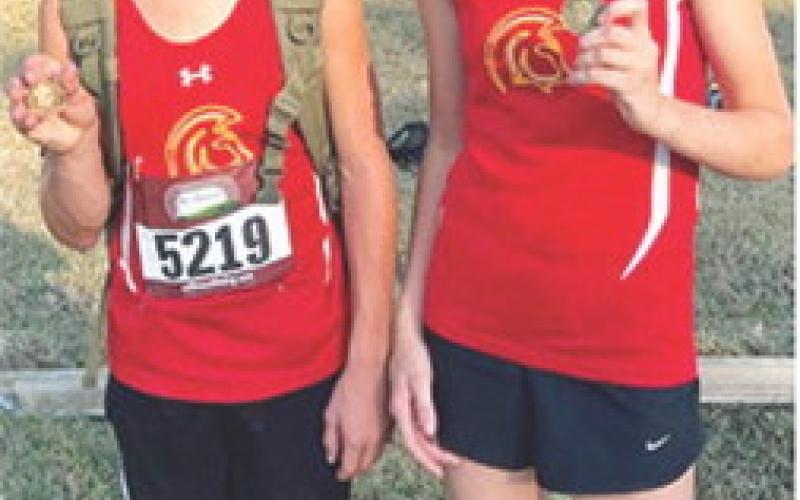 The Columbus Junior High School Cross Country Team wrapped up their 2024 season, October 10, at the Pleasanton Junior High Meet. Eli Engleman placed eighth in the seventh grade boys race and Sammi Ohmart took first place in the seventh grade girls event. Sammi placed first in four of the six meets in her rookie season and was second at the Columbus Invitational. Eli placed in the top ten at five races in his inaugural junior high season and was 14th at Columbus. Courtesy photo.