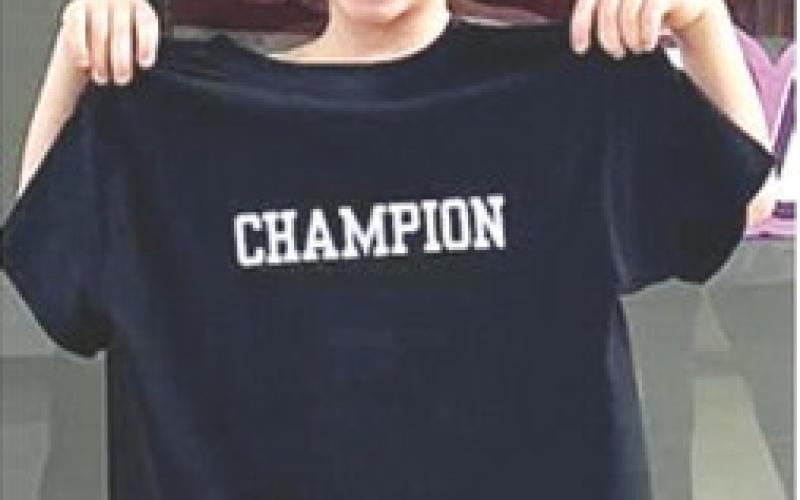 Rhett Tedlock, Columbus Wrestling Club, won the championship in the six and under, 52-pound weight class of the Her Fight is Our Fight Benefit Tournament in Pittsburg, December 28. Courtesy photo.