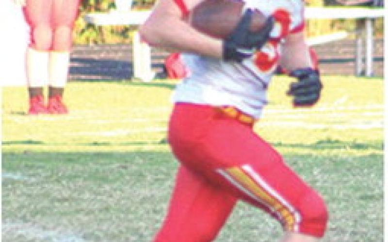 Elijah Shoemaker had a long run after catch before being pushed out of bounds at the three-yard line. He punched it in on the next play to put Columbus in the lead, 24-7, just before the first half ended at Baxter Springs, Thursday. The Titans came away with the win, 38-14 to improve to 3-2 on the season.