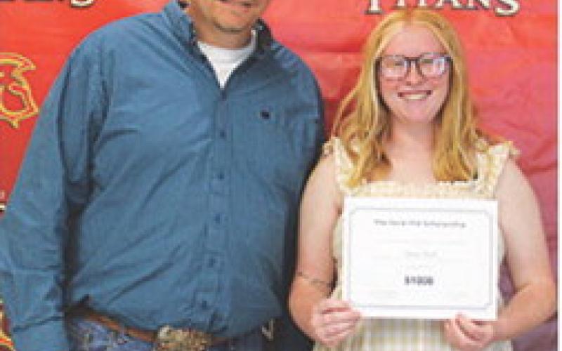 Senior, Gracie Hall, received the Ford FFA Scholarship in the amount of $1,000 during the May 15 Columbus Unified High School Senior Assembly from CUHS FFA Sponsor, KC Youngblood.