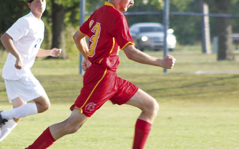 Titan Senior, Cody Ediger, pushed past a Parsons defender to score a goal in Tuesday’s home soccer match at the Central School Pitch. Parsons won 9-1.
