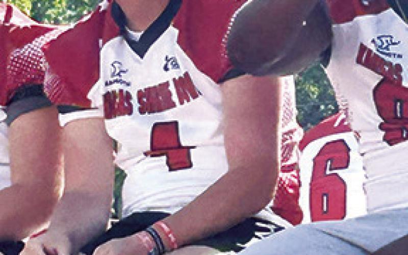 Columbus Titan 2025 Graduate, Jace Midgett, rode the float with his East Team mates during the 52nd Annual Shrine Bowl Parade, Saturday morning, prior to the bowl game, that evening. Courtesy photo.