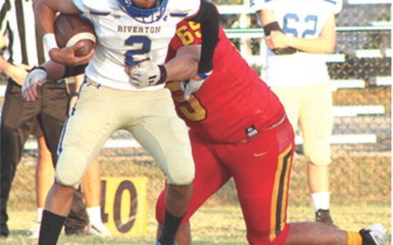 Titan Junior, Zane Gray, gets to Ram Junior, Caden Gray, in the back field for a loss of yardage in the Columbus Junior Varsity loss to Riverton, 6-13, Monday at Titan Field. Gray also handles the kicking duties for the Titans PATs on Friday nights.