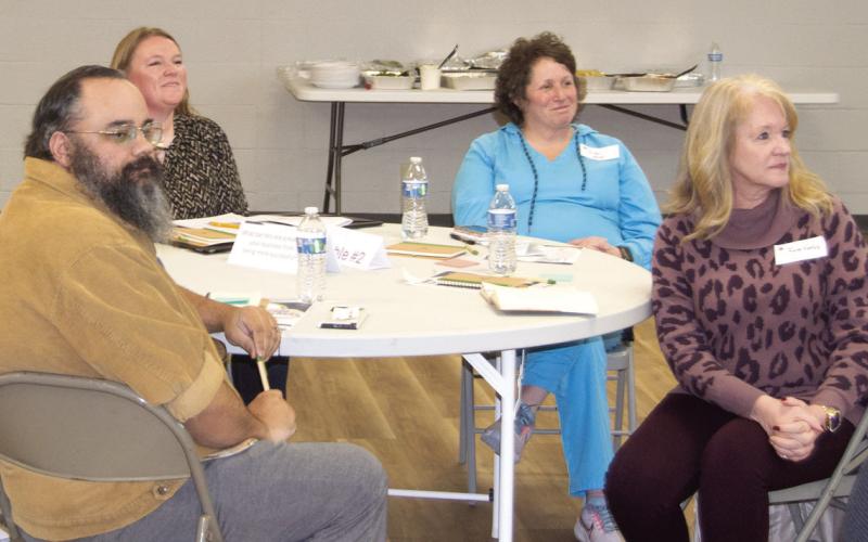 At one of the eight tables were local businessman Clinton Cooper