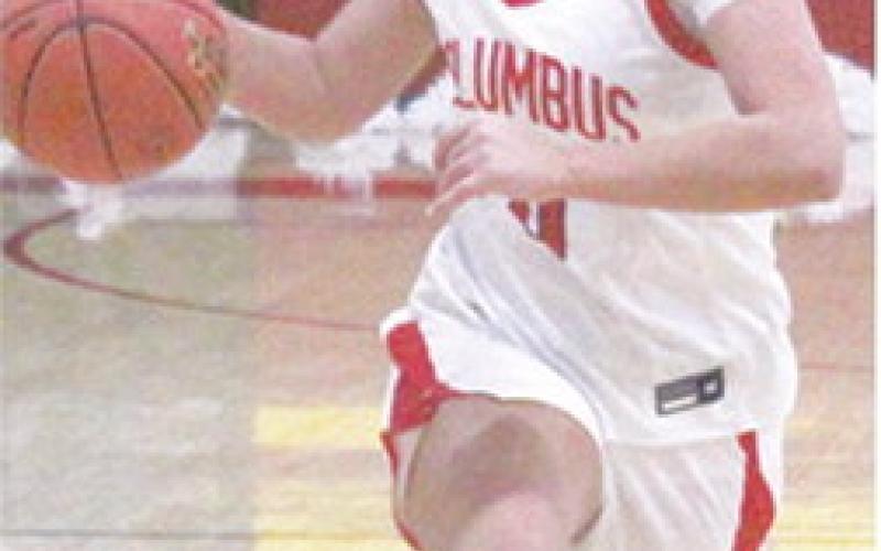 Lady Titan Senior, Katy Mooney, gets a steal and drivers for the layup in the 41-60, Columbus loss to Cherryvale, Tuesday, at the CUHS Gym. Katy scored 22 points going 13 of 14 at the free throw line.
