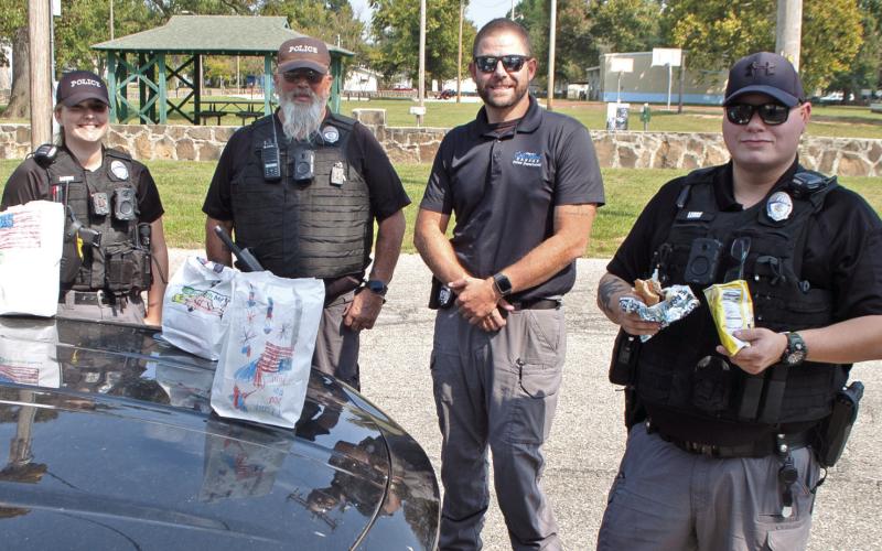Columbus first responders and veterans were treated to a free lunch Wednesday in memory of the events that occurred September 11, 2001. Columbus Police Department was represented by Officer Denise Burns, Animal Control officer Jeff Woods, Chief of Police Kyle Clark and Officer Arlo Lewke.