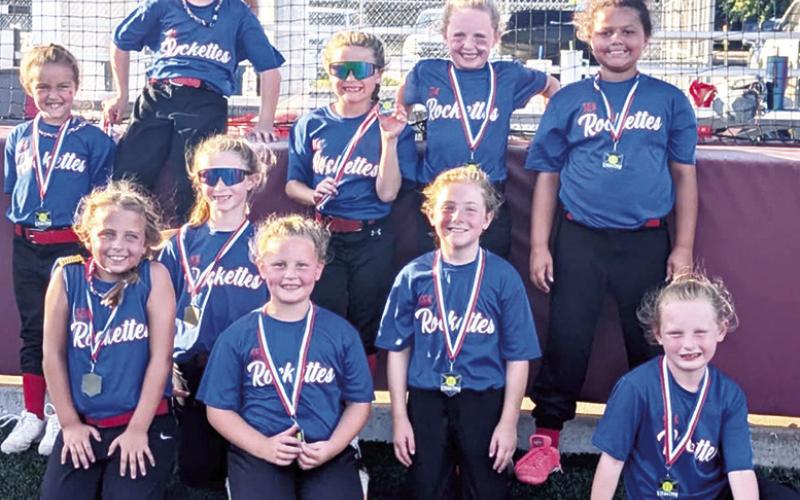 The Columbus 8 and Under Rockettes Softball Team took second place in a recent tournament in Girard. The team completed their season and will have the remainder of the summer off. Team members are: Taylynn Midgett, Mariah Moser, Amyx Evans, Oakleigh Mays, Aniah Palmer, Rosalynn Walker, Jasmine Winnegar, Kynlea Littlejohn, Payton Gulick, and Morgan Moser. Not pictured, Amelia Ellis. Coaches for the team are Lance and Anna Moser, Jeremy Gulick, and Bryan Midgett. Courtesy photo.
