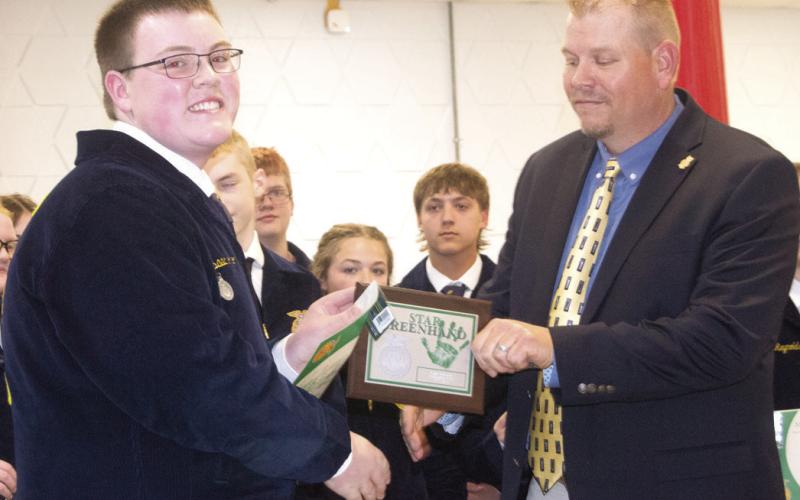 This year’s Star Greenhand award went to Isaac Johnson who’s supervised agriculture experiences (SAE) consists of working on his family’s row crop farm. He was presented the plaque by K.C. Youngblood.