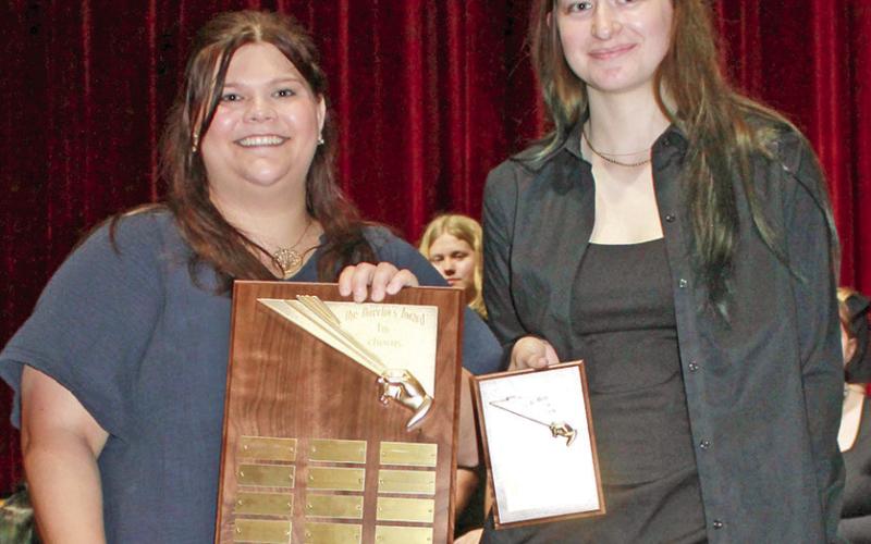 Awards were presented to outstanding Columbus vocal music students at the end of year concert Karley Jones (above) presented Kendra Scheer with the Directors Award. Three students (at right) were presented with the Clyde O. Davidson Award. They were India Daniels, Jacianna Heflin and Piper Hayes. Vocal music instructor Karley Jones presented the award.