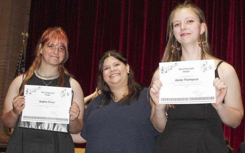 Vocal music instructor Karley Jones presented Sophia Cross and Annie Thompson with awards for Most Improved. The award were presented at the year end vocal concert at Columbus High School.