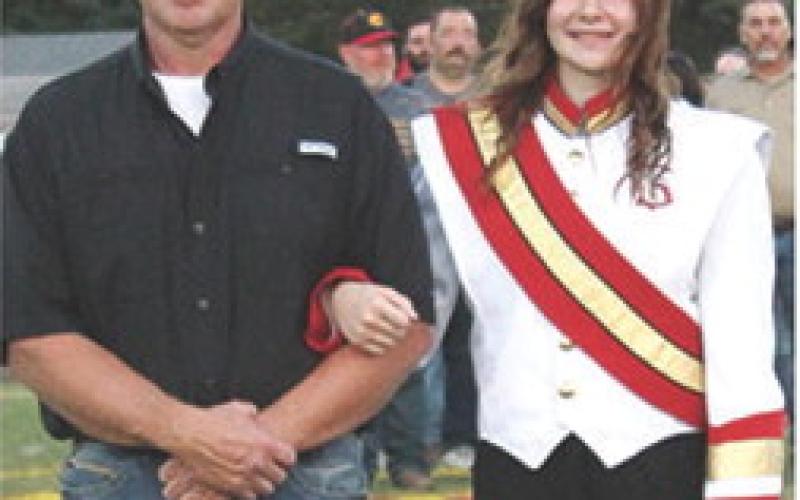 Senior, Katelyn Draeger, was recognized during Senior Night Ceremonies at Titan Stadium, October 17. Katelyn is a four-year member of the Titan Band and the Lady Titan Volleyball Team. She is the daughter of Ben and Elesha Draeger.