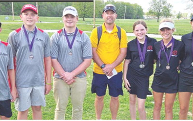 The Columbus Junior High School Golfers came away from the Pittsburg Invitational Tournament with a third place, team finish. The three Lady Titans placed in the top ten of the girls division, and Jace Mooney took fourth place in the boys division. Team members are: Jace Mooney, Tanner Thompson, Cajen Smith, Coach Jerry Smiley, Ally Walters, Tyler Kirk, and Kip Saporito. Courtesy Photo.