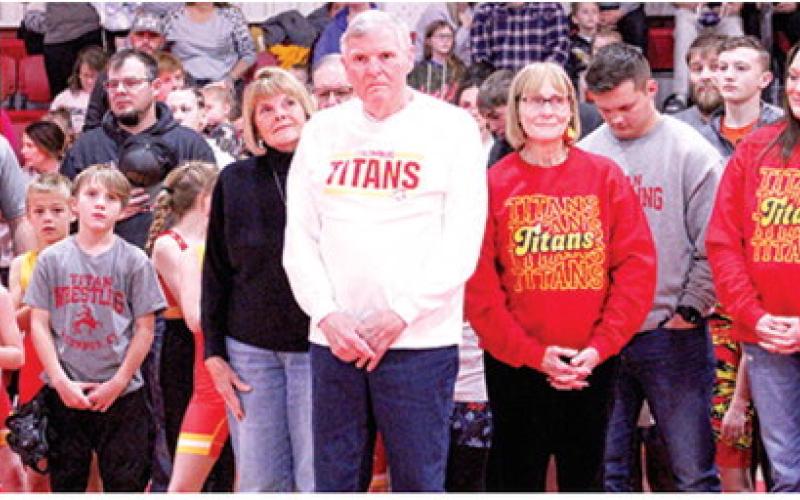 Long-time Columbus Titan Wrestling Coach, Ken Jones, was recognized during the local tournament that bears his name, the Ken Jones Classic, December 14, at the CUHS Gymnasium. In addition to the host of Columbus Wrestling Club current and past members, Ken was flanked by his sister, Karen Bowman, wife, Barbara, and daughter Ellen Lewis. (Not pictured are grand-daughter, Katherine Lewis, grandson, Kenneth Lewis, and son-in-law, Brad Lewis.