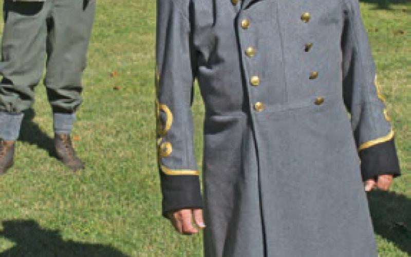 Both Confederate and Union soldiers at the re-enactment paused to listen to the words of General James Blunt who commanded the Union Army in Kansas and was a delegate to the Wyandotte constitutional convention that framed the Kansas state constitution in 1859, and served as chair of the committee on militia.