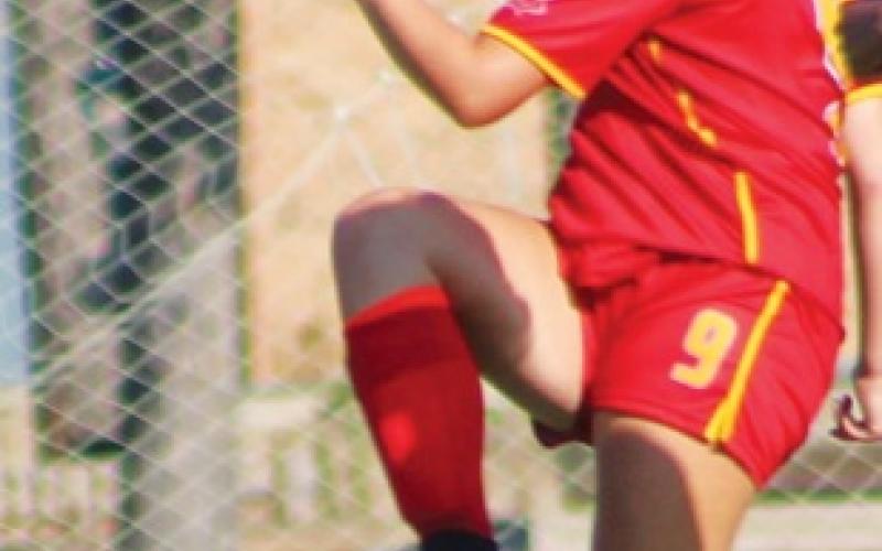 Trojans squeak past  Titan Junior Varsity