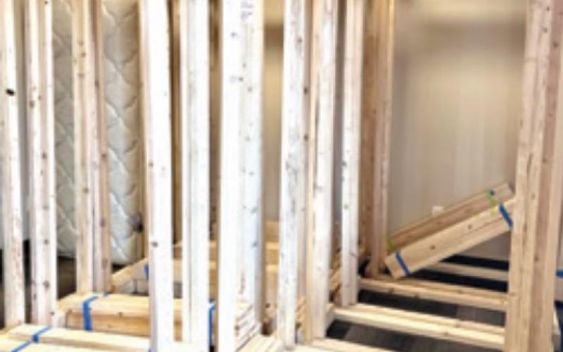 CUHS students build beds for kids