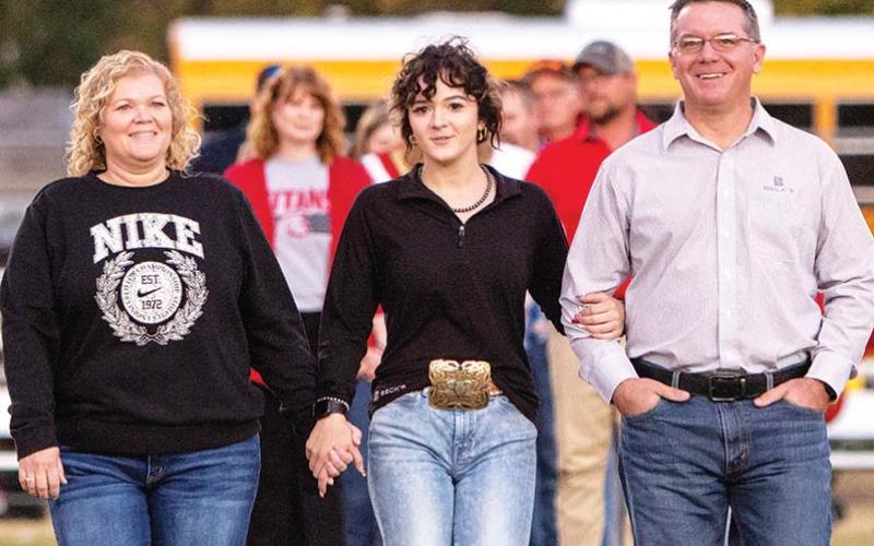 Lady Titan Senior, Emma Duling, was recognized on Senior Night, October 25, at Titan Stadium. Emma has served as the Titan Football Manager for one year. She was escorted by her parents Ragena and Bill Duling.