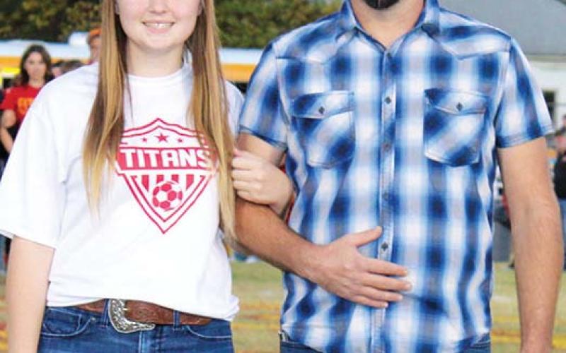 Lady Titan Senior, Zoie Elmore, was recognized on Senior Night, October 25, at Titan Stadium. Zoie is a four-year member of the Titan Soccer Team. She was escorted by her dad Bill Elmore.