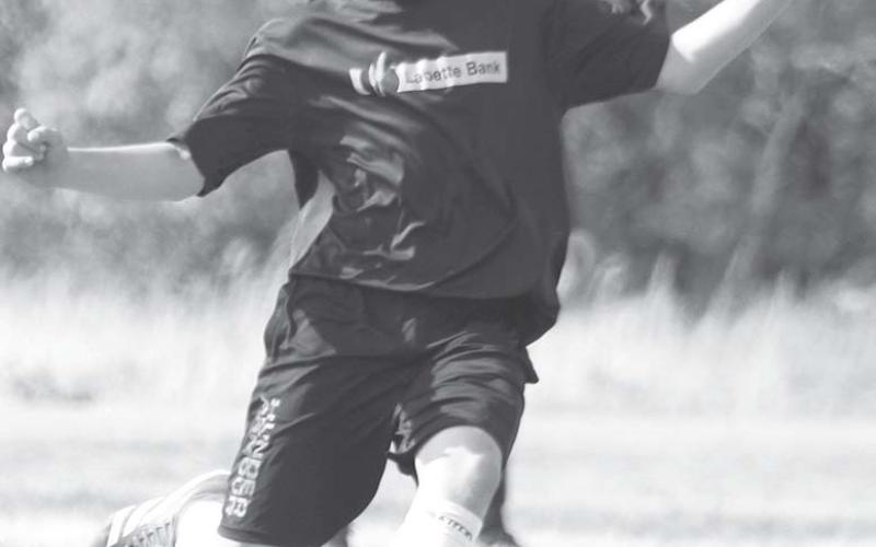 Paxton Schalk scored a goal for the Labette Bank Junior High Team in a recent home game.