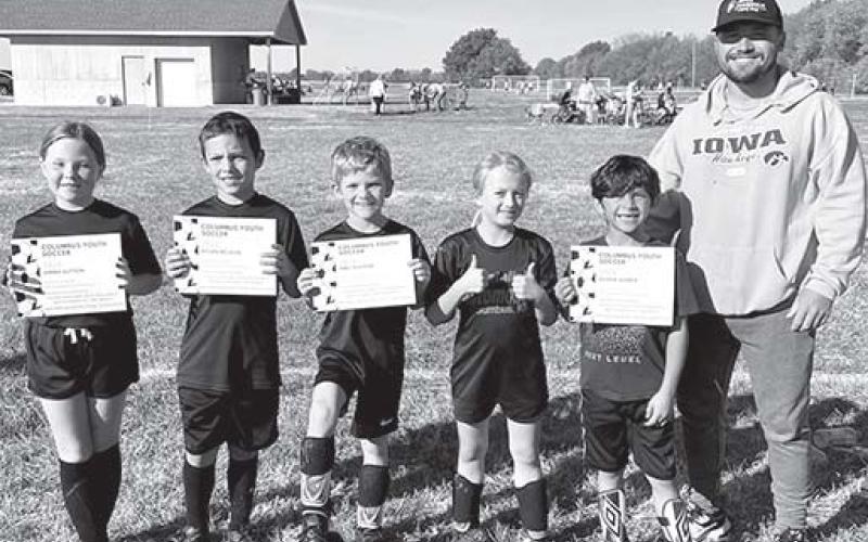 The Natalini NAPA seven and eight year old team tied for first in the Columbus Youth Soccer League. Team members received awards during a ceremony the final day of games in October at Froebe Fields in Eddington Park. The team was coached by Shawn Siemer. Player included Kenley Baxter, Abel Ellison, Kylen McLean, Dakota Napier, Oliver Siemer, Emma Sutton, and Hayden Tollette. Courtesy photo.
