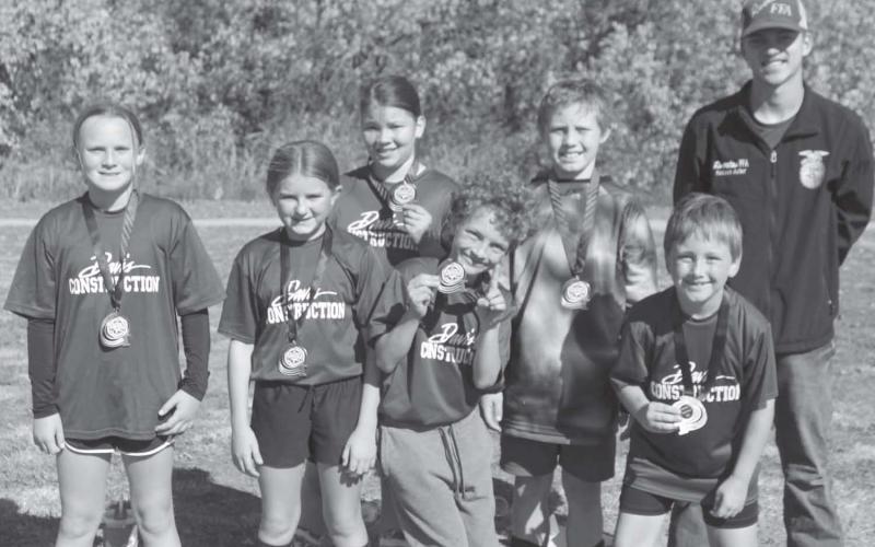 The overall winner of the nine and ten-year-old division of Columbus Youth Soccer League is the Davis Construction Team coached by Hudson Asher. The team was recognized at the awards ceremony on the final day of games at Eddington Park in October. Team members are: Beckett Asher, Luke Bell, Gracyn Carter, Hudson Mogle, Danielle Perdue, Tucker Siemer, and Riley Spear. Courtesy photo.