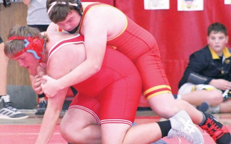 Smith wins three in junior high wrestling scramble