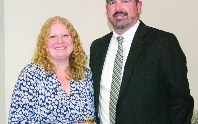 Jordan Epler received the Golden Apple award for teaching excellence in the USD 493. The High School math teacher was nominated by multiple students for her ability to help students understand math concepts. Epler has made a major impact on her students and the community. The award was presented by High School Principal Dan Grundy.