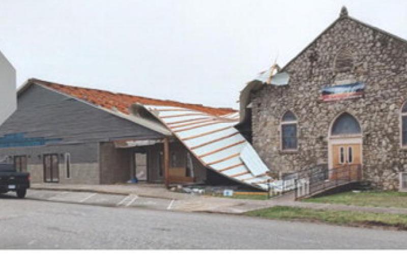 Shortly after midnight Saturday a storm blew into Cherokee County with high winds and rain. The roof of the First Assembly of God Church in Galena was blown off and was laying beside the structure. Courtesy photo.