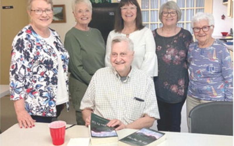 Author and former Columbus resident William Stoskopf is surrounded readers’ group members Lorna Stover, Dora Dunlap, Jane Rhinehart, Mary Torcia and Peggy LaCoste. Courtesy photo.