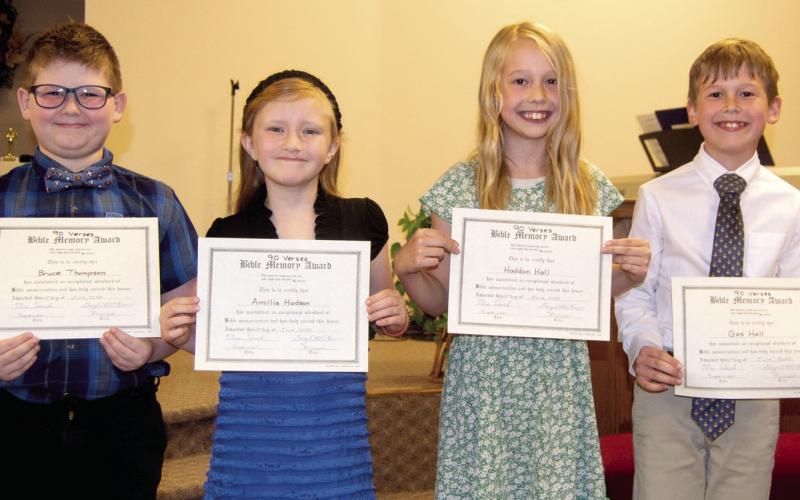 Bruce Thompson, Amillia Hudson, Haddon Hall and Gus Hall were all recognized at the recent Life Christian awards ceremony. Each youngster memorized 90 Bible verses.