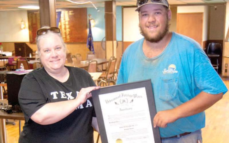 Members of the VFW Auxiliary were moving their charter from the former VFW home the American Legion home.