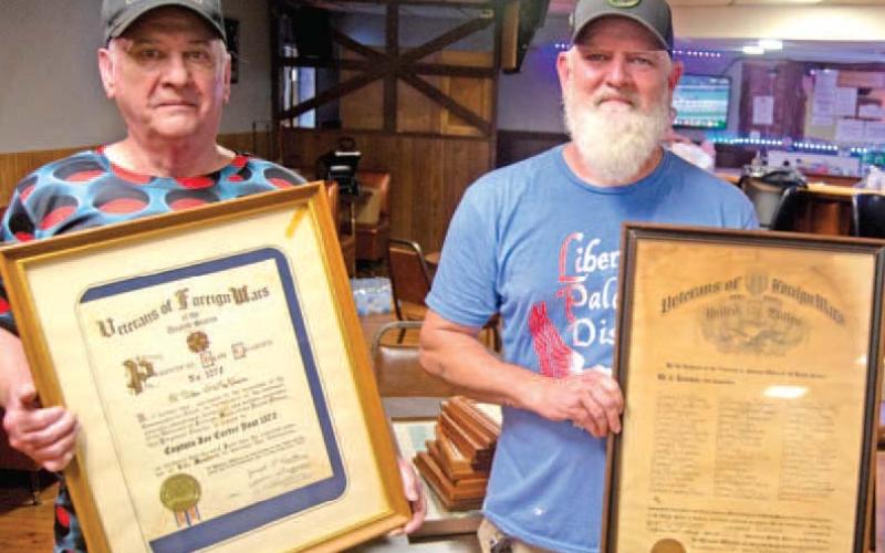 VFW Commander Jeremy Carriger and Steve Hale were moving the club charters from the former home to a new location at the American Legion building.