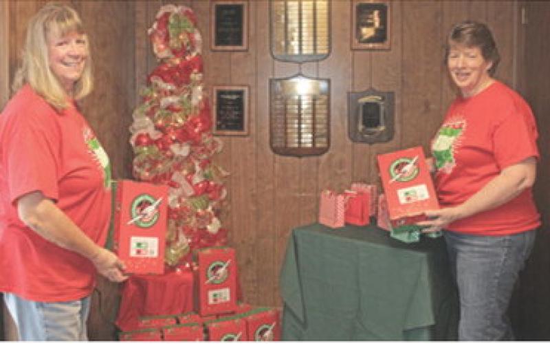 Charlotte Scott and Linda Griffitt are volunteers at the Columbus First Baptist Church drop off location for Samaritan’s Purse Operation Christmas Child. If you would like to donate items or money for a box, contact the church.