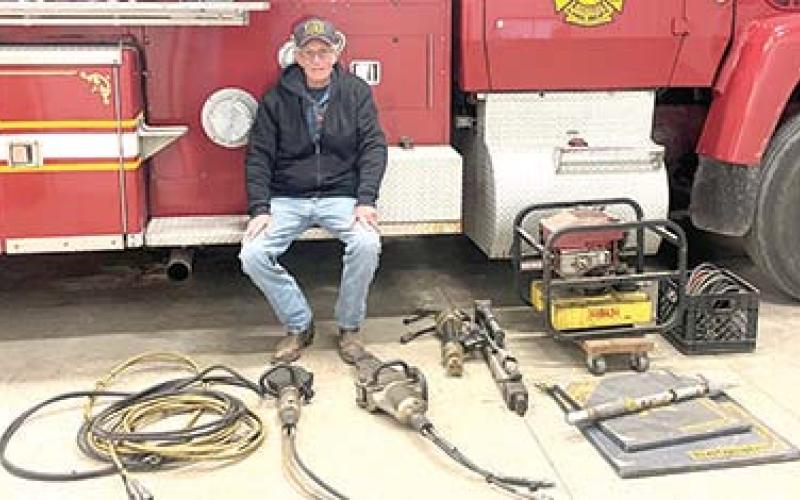 West Mineral Fire Chief Randy Johnson surveys the extraction equipment his department received from the Columbus Fire and Rescue to help improve rescue service in the northern part of the county.