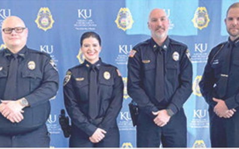 Aeriel Tennell recently completed classes at the Kansas Law Enforcement Training Center. She is employed by Columbus Police Department. Officers Arlo Lewke, Preston Hosier and Chief Kyle Clark attended her graduation ceremony. Courtesy photo.