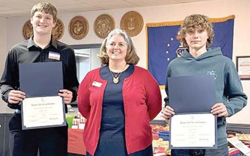 Briley Brakebill, (right) was named the eighth grade Daughters of the American Revolution chapter essay winner. Corbin Wheeler and Gavin Potts (above) coproduced a video that earned first place at both the chapter and state levels. All three are students in Mary Colvin’s Southeast eighth grade American History class. Courtesy photo.