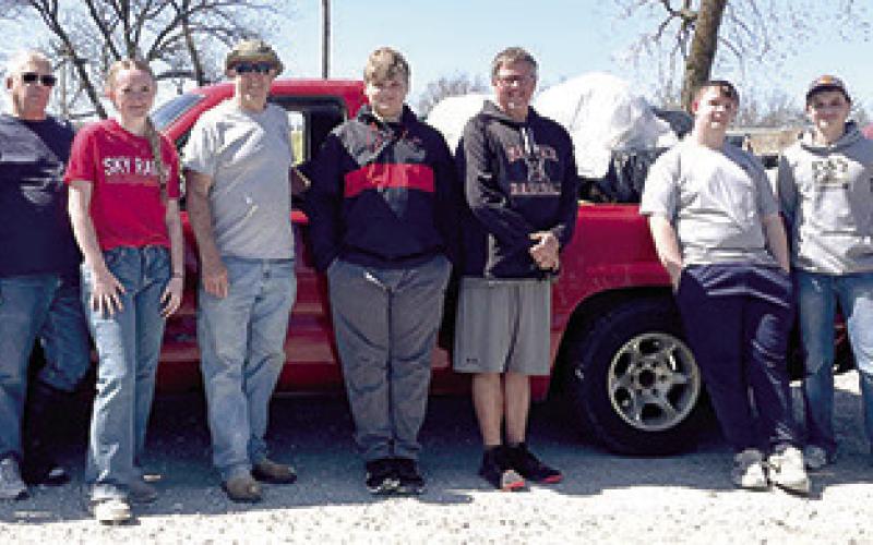 Members of the Baxter Springs Kiwanis and Key Clubs spent a Saturday morning recently cleaning up the city of Baxter Springs. Courtesy photo.