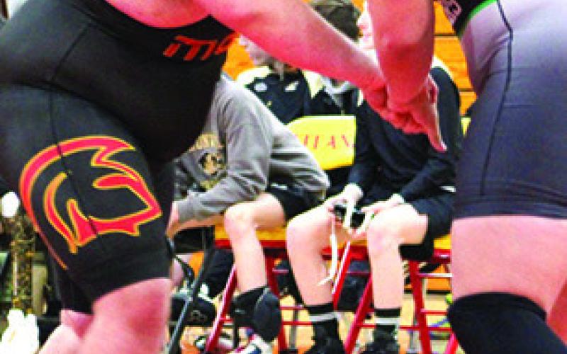 Titan Senior, Jake Eddington, opens his match with Van Buren’s Ethan Hurst. Jake won the match by fall, one of his five wins in the Titans Five-Team Duals held December 17 at the CUHS Gym.