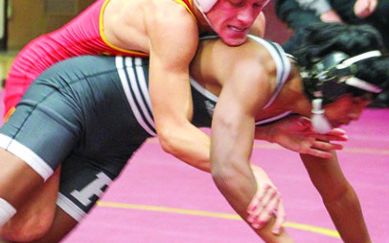 Titan Senior, Cade Saporito, won both of his matches by fall at Girard, December 8. Cade won five matches in the Titan Five-Team Duals, December 17 at the Columbus Unified High School Gymnasium.