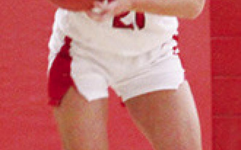 Lady Titan Sophomore, Americus Woodcock, faces off with her Riverton opponent in Tuesday’s loss to the Lady Rams, 40-63, at the CUHS Gym. Americus had nine points for Columbus in the loss.