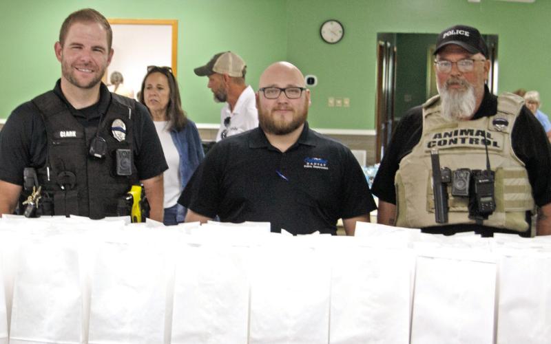 A large number of law enforcement officers and emergency services personnel came out to the fundraiser in support of the family of Jason Daniels. Chief Kyle Clark, Officer Marcus Harmon and Animal Control Officer Jeff Woods were among those in attendance. Chief Daniels was a vital part of the community and there will be a celebration of life service Saturday, June 8 in the Oswego City Park from noon to 4 p.m. for those who would like to attend.