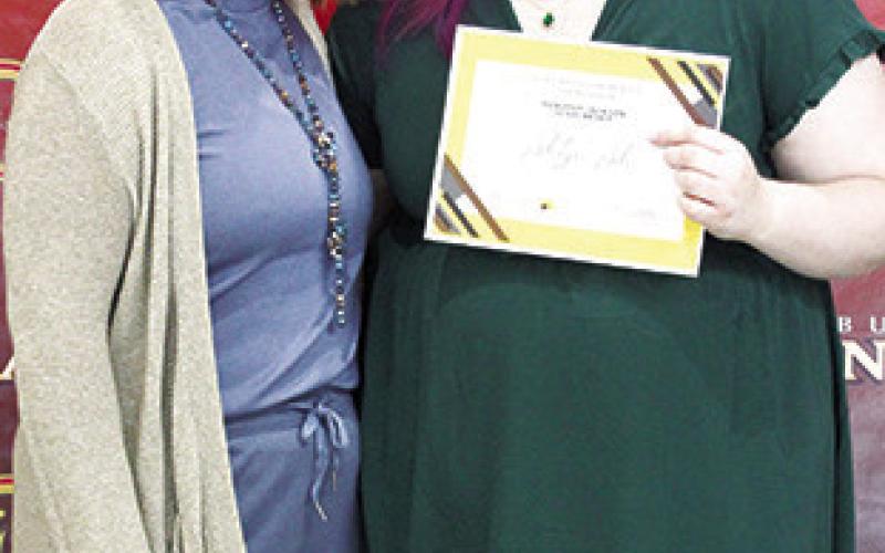 Ashlyn Ash received the Dorothy Jackson Columbus Community Foundation Scholarship in the amount of $2,000 at the Senior Assembly, May 16, in the Columbus Unified High School Gymnasium. The presentation was made by Kelly Walters, USD 493 Title 1 Reading Specialist.