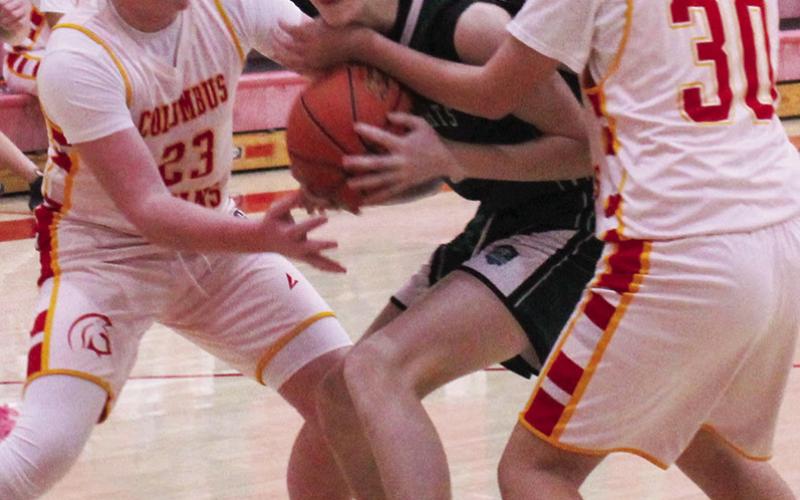 Despite the defense of Titan Eighth Graders, Jex Cheney and Kannon Roberts against their New Heights Christian Academy opponents, the Cougars came out victorious, 55-12, in the Columbus Jamboree, Saturday, at the Central Gym. See full report on page six of today’s News-Report.