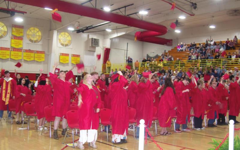 Members of the Class of 2022 celebrated the culmination of their high school careers Saturday afternoon with the famous cap toss. Photo by Jacob Spencer.