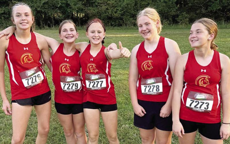 Columbus Junior High Lady Titans competed in their first meet of the season at the Girard Invitational Cross Country Meet, September 11, at the Greenbush course. Eighth Graders Sammi Ohmart, Cora Rider, Hieyla Shelton, Lydia Wilkins, and seventh grader, Lindee Smiley completed the two-mile course with four of the five competitors in the top ten of their age groups. Courtesy photo.