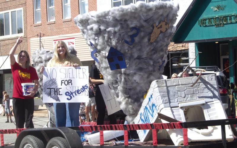 Above the senior class float proclaims “No shelter for the streaks”. Below the junior class float sported a football field themed creation. The Titans played Neodesha for their homecoming game.