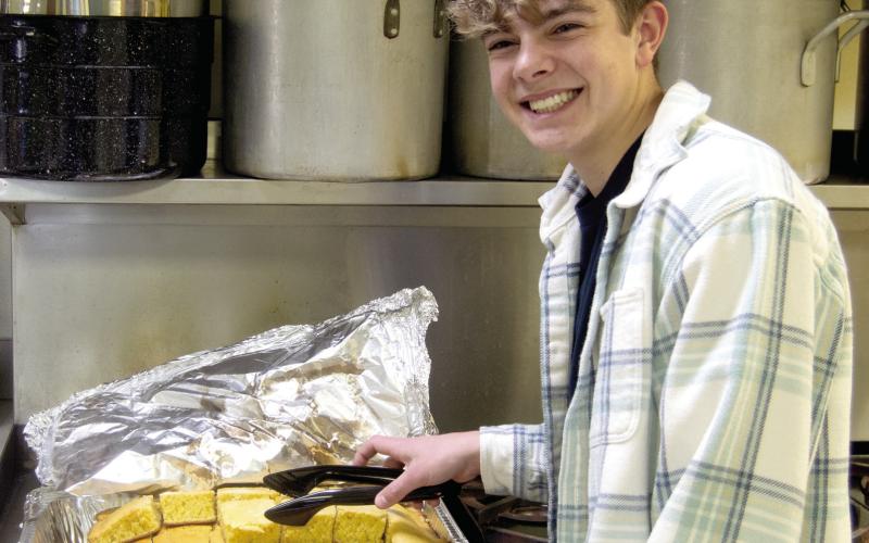 It is the time of the year for organizations to have fundraisers with local favorites from the kitchen. The Columbus Lions Club held their annual Bean or Vegetable Soup feed at the St. Rose Parish Hall on Thursday, March 6. Easton Long, a member of the Leo Club at Columbus High School helped serve the homemade cornbread.